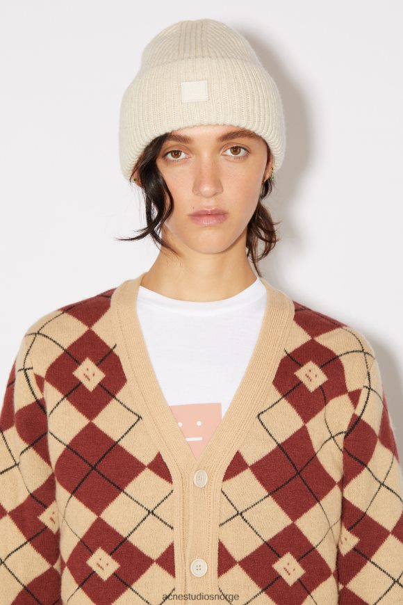 Acne Studios liten lue med logo med ansikt N2PP4F812 tilbehør havregryn melange