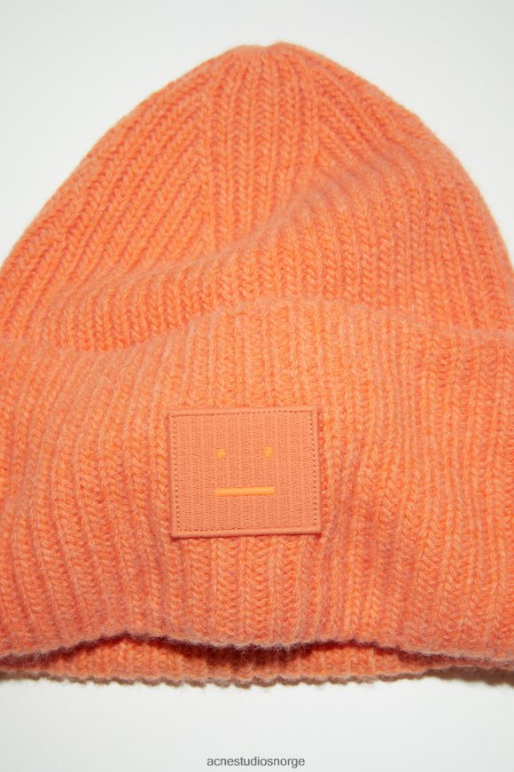 Acne Studios stor ansiktslogo lue N2PP4F778 tilbehør mandarin oransje melange